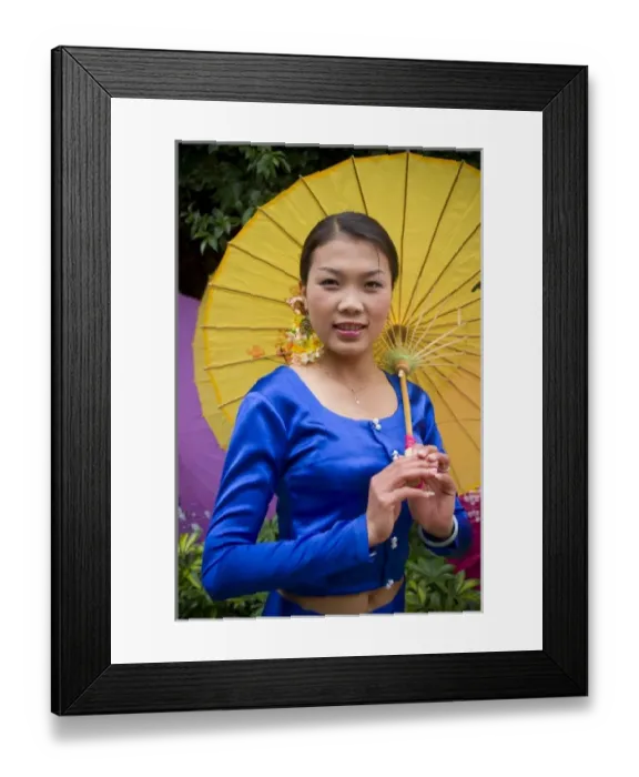 Framed Print : Asia, China, Yunnan Province. Young Dai minority woman in traditional ethnic costume