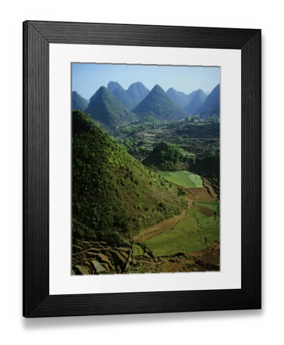 Framed Print : Asia, China, Guizhou Province, Xingyi. Limestone karst mountains surround farm fields Framed Print : Asia, China, Guizhou Province, Xingyi. Limestone karst mountains surround farm fields