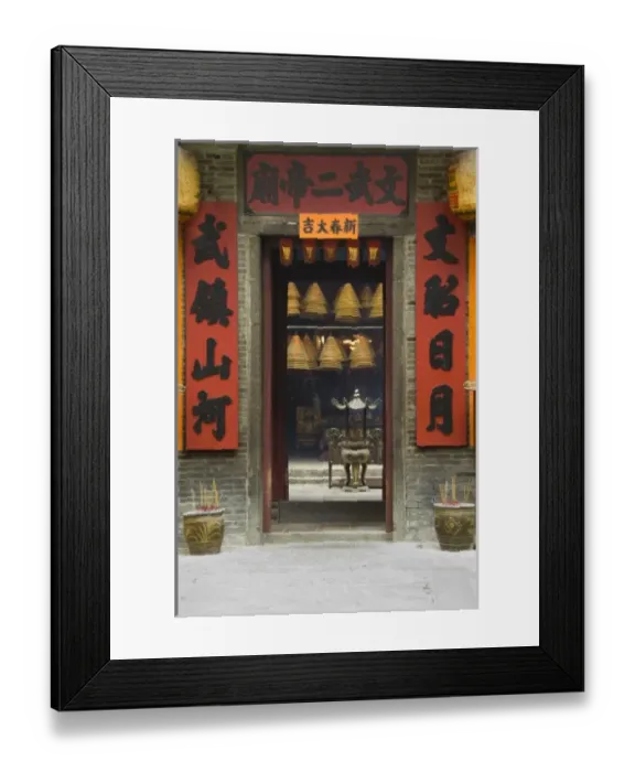 Framed Print : China, Hong Kong, New Teritories, Tai Po area. Entry to famous Man Mo Temple, hanging Framed Print : China, Hong Kong, New Teritories, Tai Po area. Entry to famous Man Mo Temple, hanging