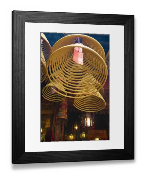 Framed Print : China, Hong Kong, New Territories, Tai Po area. Man Mo Temple. Large coils of burning