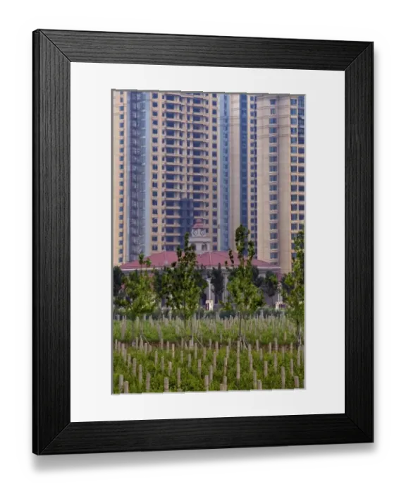 Framed Print : Tall apartment buildings next to vineyard at Chateau Changyu-Castel, a joint venture