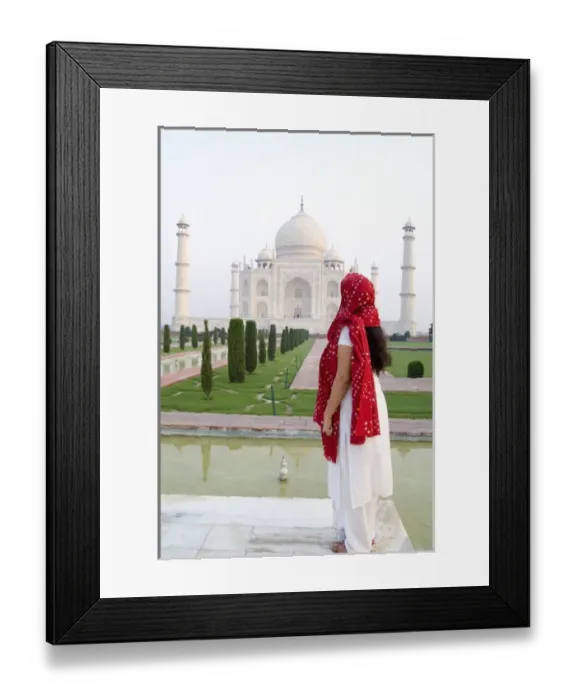 Framed Print : Hindu woman with colorful sari veil in the quiet peaceful Taj Mahal one of the wonders