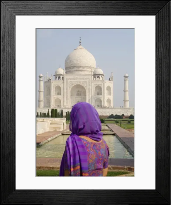 Framed Print : Hindu woman with colorful sari veil in the quiet peaceful Taj Mahal one of the wonders
