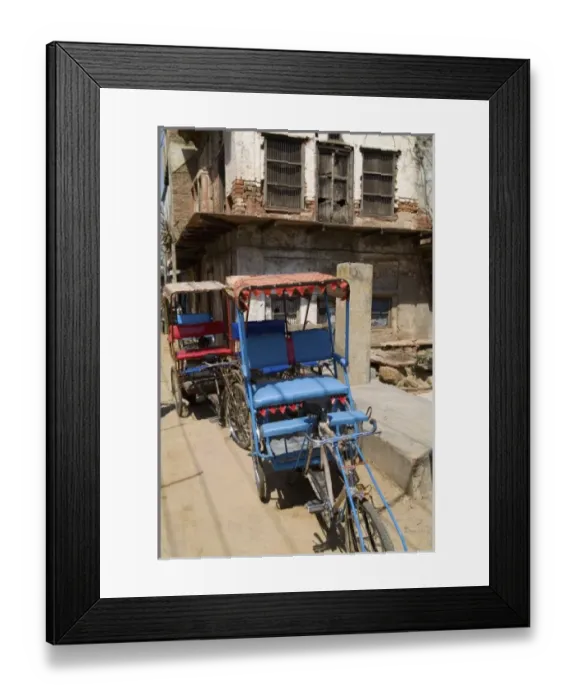 Framed Print : Abstract bicycle rickshaw on rugged street of the religious village of Mathura India Framed Print : Abstract bicycle rickshaw on rugged street of the religious village of Mathura India
