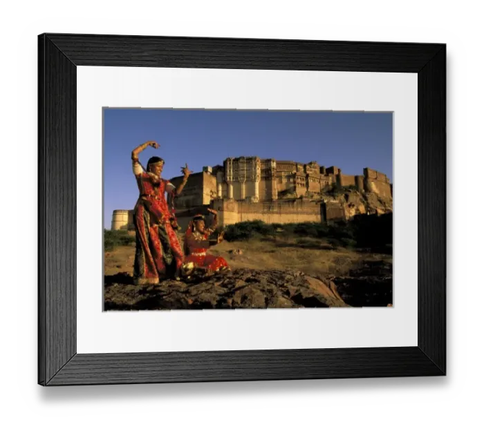 Framed Print : Asia, India, Jodhpur. Two women dancing in front of Meherangarh Fort. MR