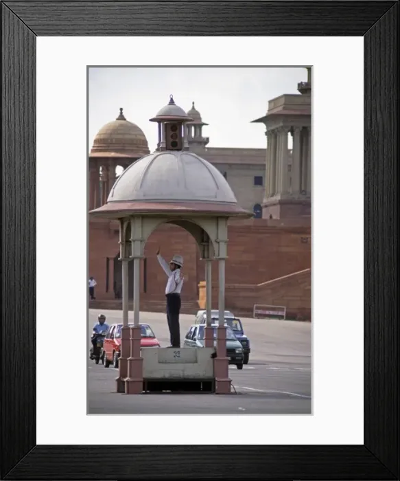 Framed Print : A traffic officer in Delhi, India Framed Print : A traffic officer in Delhi, India