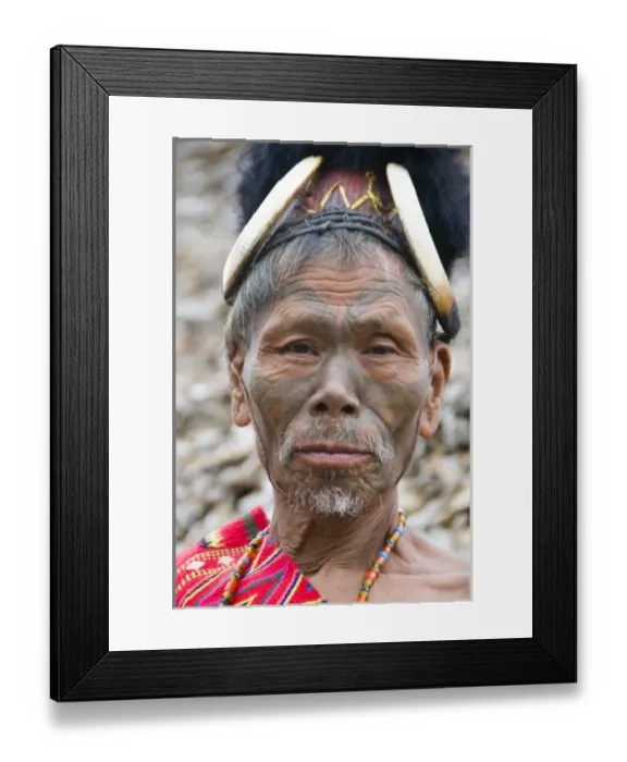 Framed Print : Shanghah Chingnyu Village, Nagaland, northeast India, old tattoed man dressed in Framed Print : Shanghah Chingnyu Village, Nagaland, northeast India, old tattoed man dressed in
