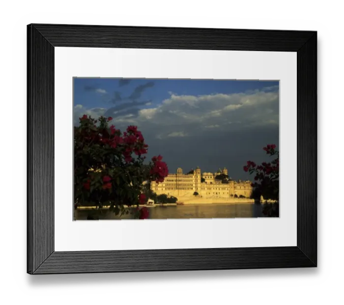 Framed Print : India, Rajasthan, Udaipur. View of City Palace, now a museum from Lake Palace Hotel on Pichola Lake
