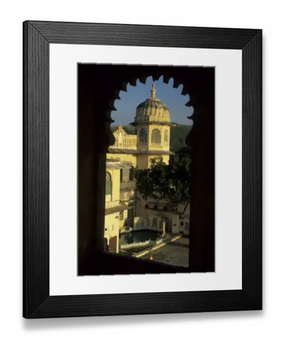 Framed Print : India, Rajasthan, Udaipur. Maharajas Palace viewed through arch of Fateh Prakash Hotel Framed Print : India, Rajasthan, Udaipur. Maharajas Palace viewed through arch of Fateh Prakash Hotel