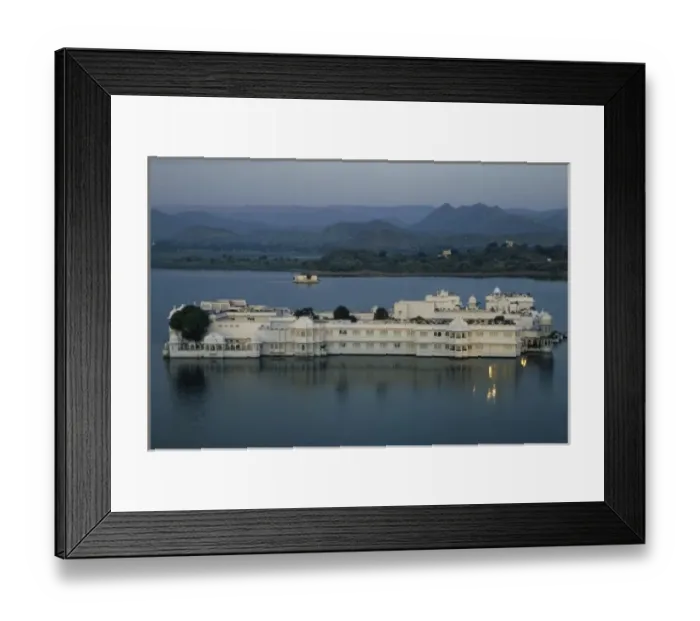 Framed Print : India, Udaipur. View of City Palace, now a museum, from Lake Palace Hotel on Pichola Lake