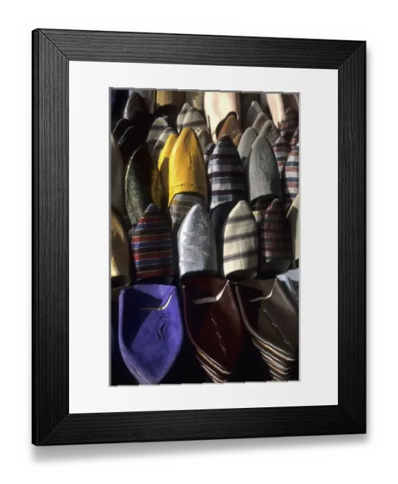 Framed Print : Graphic image of Morocco shoes stacked for sale on streets in Casablanca Morocco Africa Framed Print : Graphic image of Morocco shoes stacked for sale on streets in Casablanca Morocco Africa