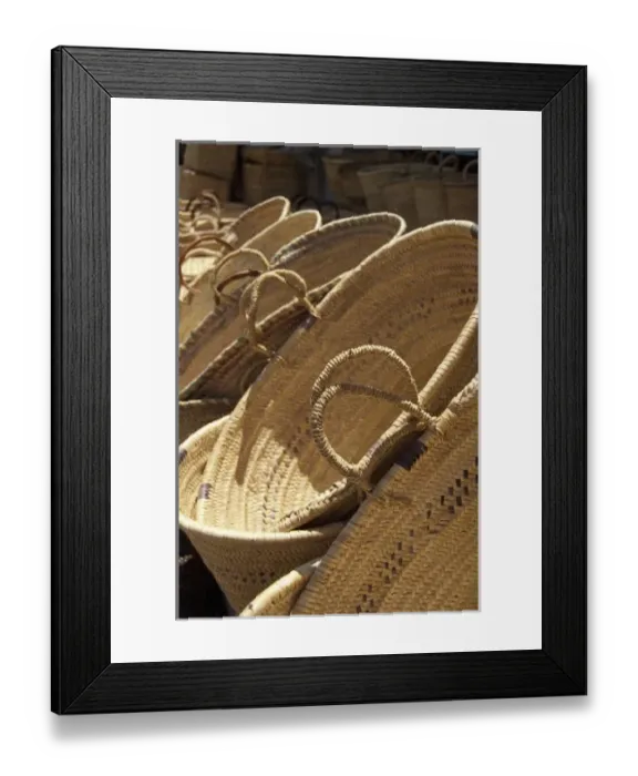 Framed Print : Africa, Morocco, Casablanca. Central Market (aka Olive Market). Basket vendor