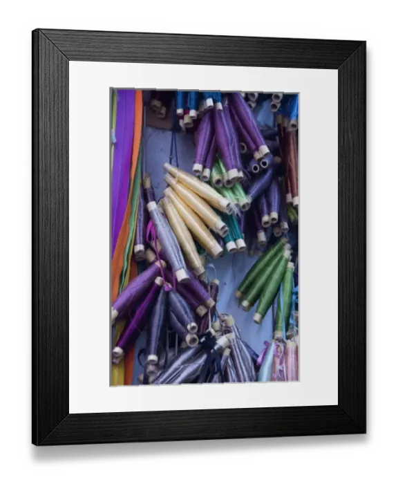Framed Print : Morocco, Tetouan. The medina (old town) of TEtouan, UNESCO. Silk thread in typical dress makers shop Framed Print : Morocco, Tetouan. The medina (old town) of TEtouan, UNESCO. Silk thread in typical dress makers shop