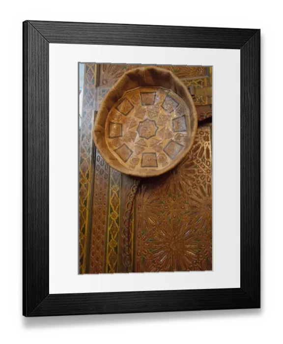 Framed Print : Morocco, Tetouan. Historic medina bazaar. Tooled leather seat hanging on ornate wooden door Framed Print : Morocco, Tetouan. Historic medina bazaar. Tooled leather seat hanging on ornate wooden door