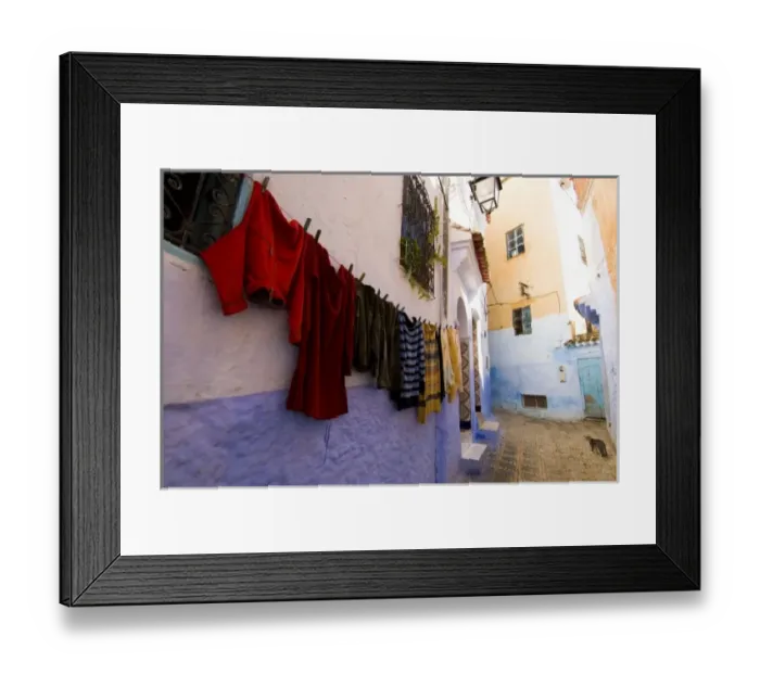 Framed Print : Chefchaouen Morocco laundry hanging on a wall in the medina Framed Print : Chefchaouen Morocco laundry hanging on a wall in the medina