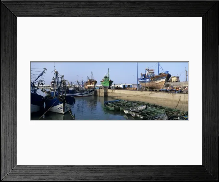 Framed Print : Africa, Morocco, Morning sun lights shipping dock outside old medina in city of Essaouira Framed Print : Africa, Morocco, Morning sun lights shipping dock outside old medina in city of Essaouira