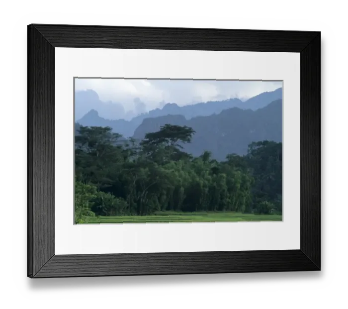 Framed Print : Indonesia, Sulawesi, Tana Toraja region. Karst limestone mountains behind lush forests Framed Print : Indonesia, Sulawesi, Tana Toraja region. Karst limestone mountains behind lush forests