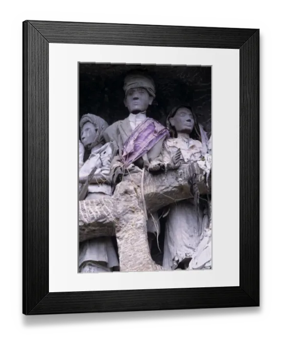 Framed Print : Indonesia, Sulawesi, Tana Toraja region. Tau tau, effigies of departed nobles, guard Framed Print : Indonesia, Sulawesi, Tana Toraja region. Tau tau, effigies of departed nobles, guard