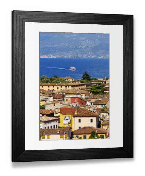 Framed Print : Italy, Lake Garda. One of the many ferries on Lake Garda approaches the village of Limone Framed Print : Italy, Lake Garda. One of the many ferries on Lake Garda approaches the village of Limone