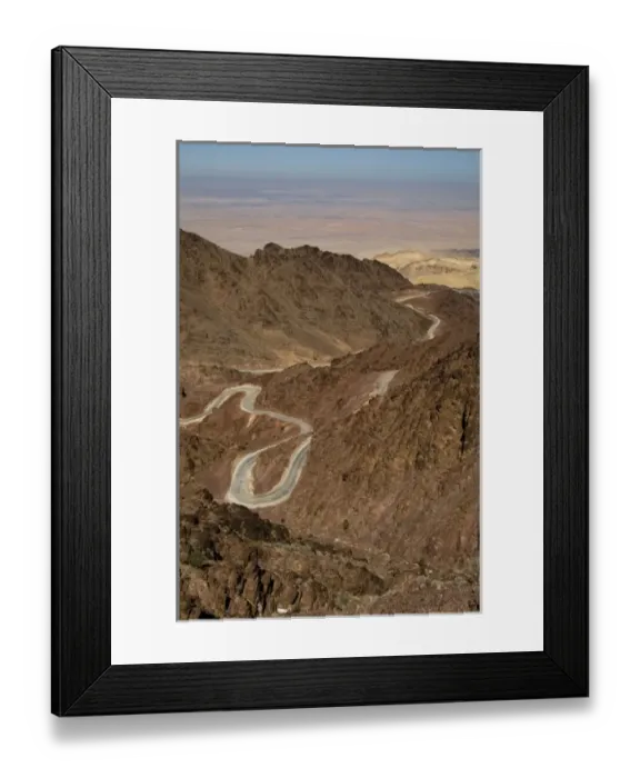 Framed Print : Jordan, Wadi Araba, the winding road from Wadi Musa to Wadi Araba