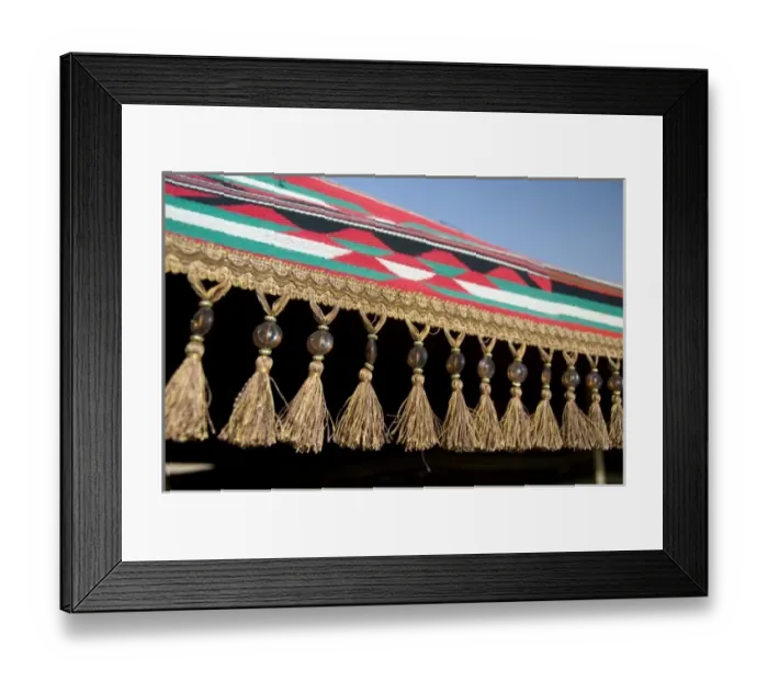Framed Print : Jordan, Wadi Rum. Traditional Bedouin tent cover with beaded tassels