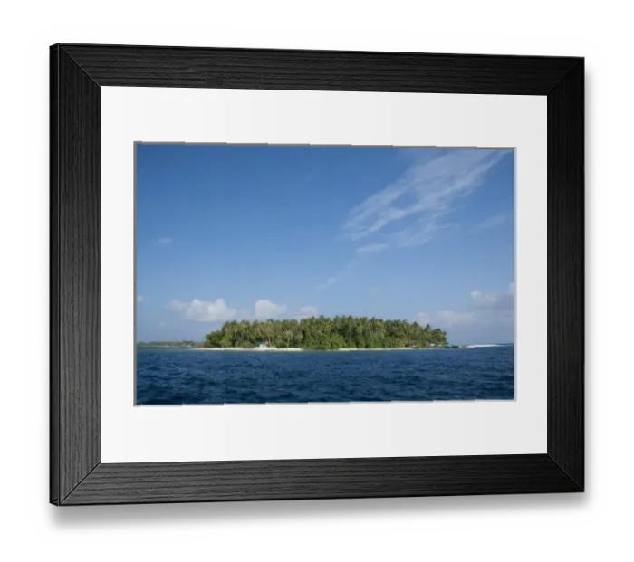 Framed Print : Maldives, North Male Atoll, Island of Kuda Bandos. Resort island of Bandos in the distance