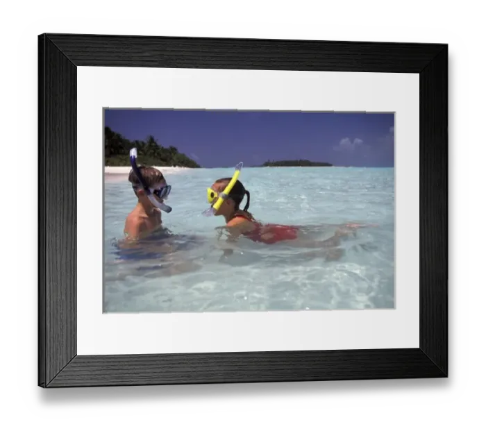Framed Print : Maldives. Kids aged 12 snorkelling (MR) Framed Print : Maldives. Kids aged 12 snorkelling (MR)