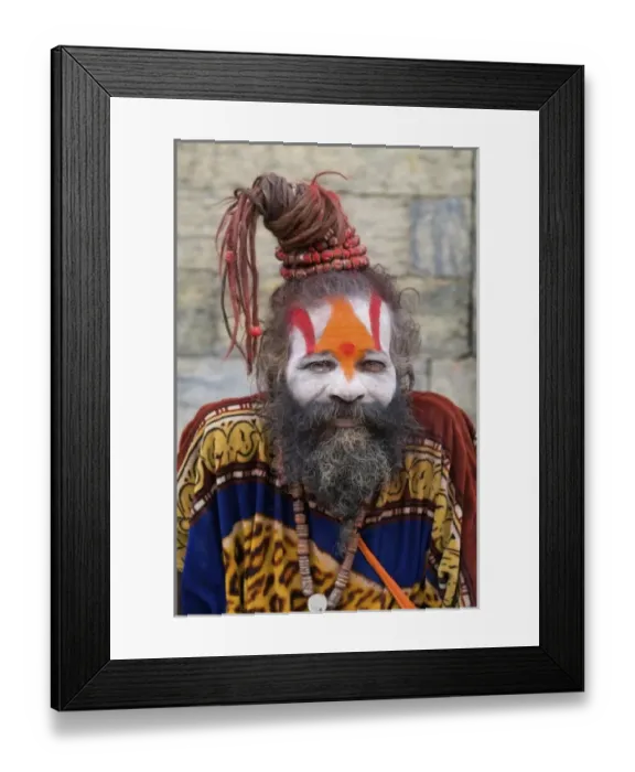 Framed Print : Kathmandu Nepal religious man who is a character painted in costume near river Framed Print : Kathmandu Nepal religious man who is a character painted in costume near river
