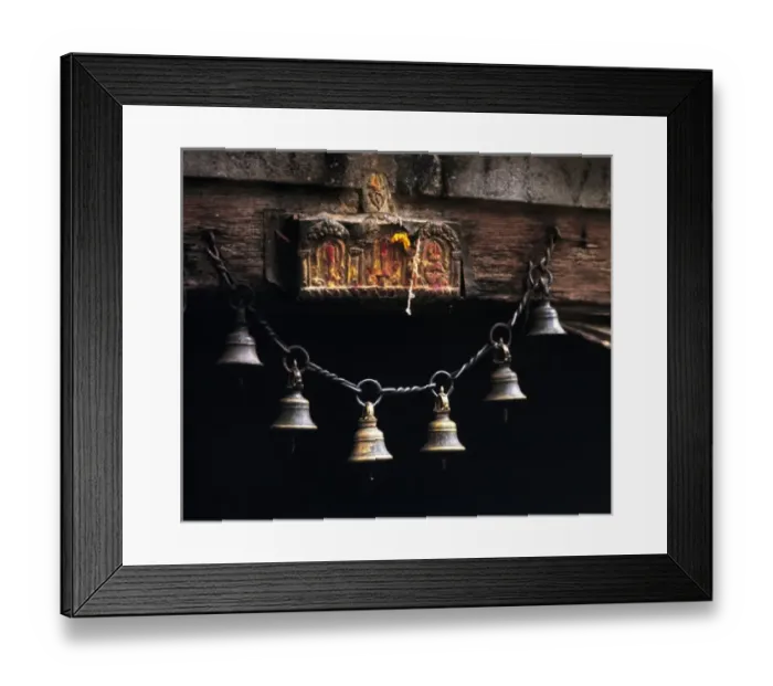 Framed Print : Asia, Nepal, Kathmandu Valley. Brass bells hang from a chain below an offering site Framed Print : Asia, Nepal, Kathmandu Valley. Brass bells hang from a chain below an offering site