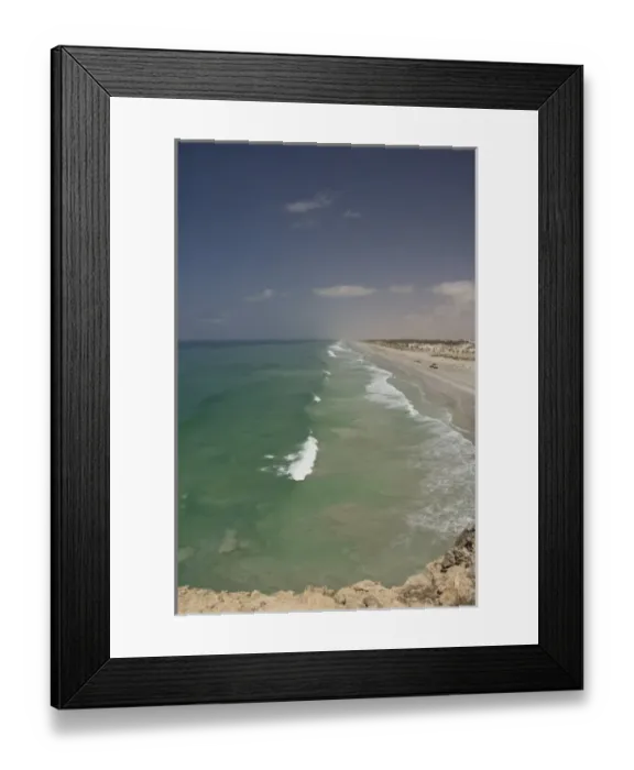 Framed Print : Oman, Dhofar, Salalah. Cliff overlooking the fishing village of Taqa along the Arabian Sea Framed Print : Oman, Dhofar, Salalah. Cliff overlooking the fishing village of Taqa along the Arabian Sea