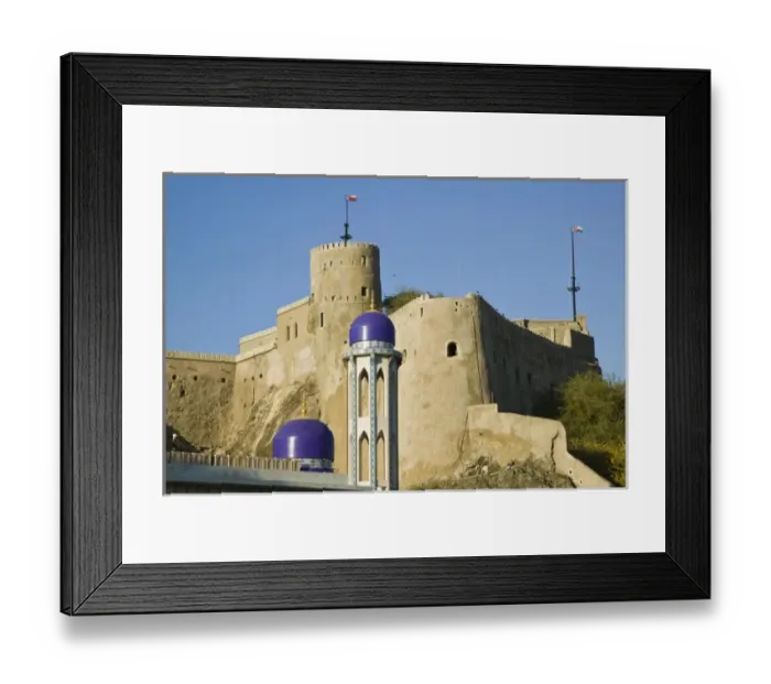 Framed Print : Oman, Muscat, Walled City of Muscat. Mirani Fort and Mosque Minarets Framed Print : Oman, Muscat, Walled City of Muscat. Mirani Fort and Mosque Minarets
