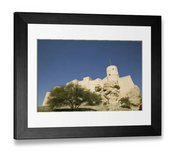 Framed Print : Oman, The Batinah Plain, Nakhal. Nakhal Fort at the foot of the Hajar Mountains / Exterior Framed Print : Oman, The Batinah Plain, Nakhal. Nakhal Fort at the foot of the Hajar Mountains / Exterior