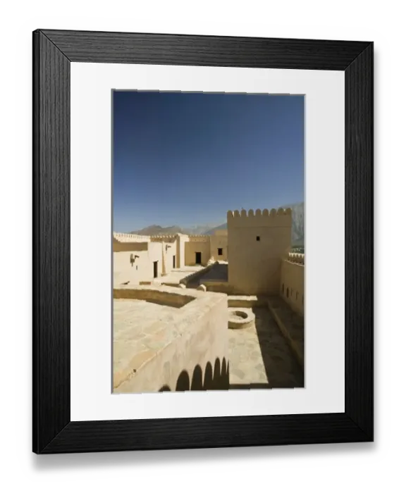 Framed Print : Oman, The Batinah Plain, Nakhal. Nakhal Fort, at the foot of the Hajar Mountains