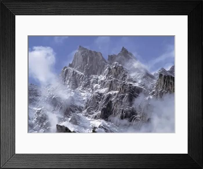 Framed Print : Pakistan, N-W Frontier Province, Naltar Valley. Clouds rise above the jagged flank Framed Print : Pakistan, N-W Frontier Province, Naltar Valley. Clouds rise above the jagged flank