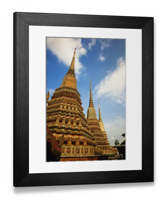 Framed Print : Upward view of trio of chedi, Wat Pho, Bangkok, Thailand
