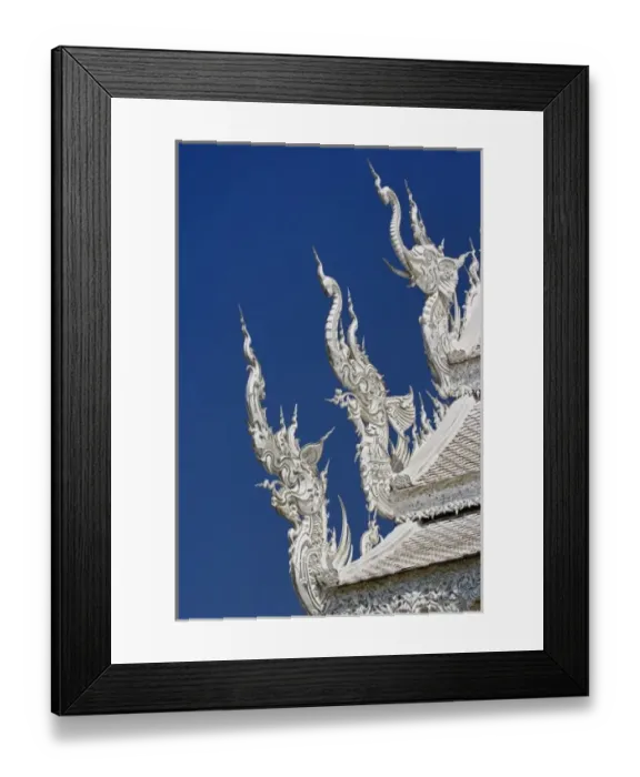 Framed Print : Architectural details (Elephant & Dragon) on the new all white temple of Wat Rong Framed Print : Architectural details (Elephant & Dragon) on the new all white temple of Wat Rong