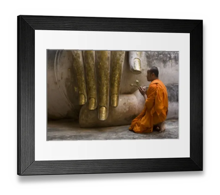 Framed Print : Monk making offering to Wat Si Chum Buddha Framed Print : Monk making offering to Wat Si Chum Buddha