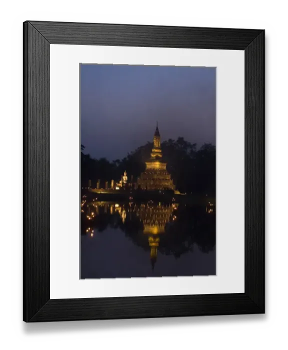 Framed Print : Stupa at Sukothai historical site lit up with candles for Loi Krathong Framed Print : Stupa at Sukothai historical site lit up with candles for Loi Krathong