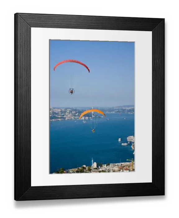 Framed Print : Two powered paragliders flying over Uskudar, aerial view, Bosphorus and the European Framed Print : Two powered paragliders flying over Uskudar, aerial view, Bosphorus and the European