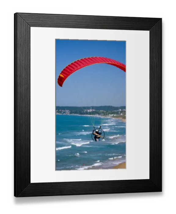Framed Print : Powered paraglider flying over Gumusdere beach on the Black Sea coast of Istanbul Framed Print : Powered paraglider flying over Gumusdere beach on the Black Sea coast of Istanbul
