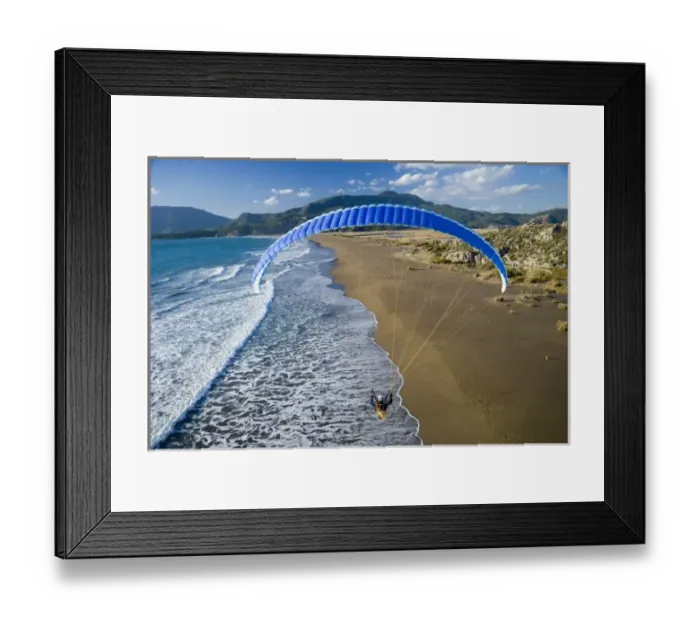 Framed Print : Powered paraglider flying over beach in Dalyan, aerial view, Koycegiz, Mugla, Turkey Framed Print : Powered paraglider flying over beach in Dalyan, aerial view, Koycegiz, Mugla, Turkey