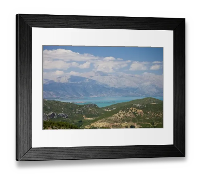 Framed Print : View of Lake Egirdir beyond hilly green land, Isparta, Turkey Framed Print : View of Lake Egirdir beyond hilly green land, Isparta, Turkey
