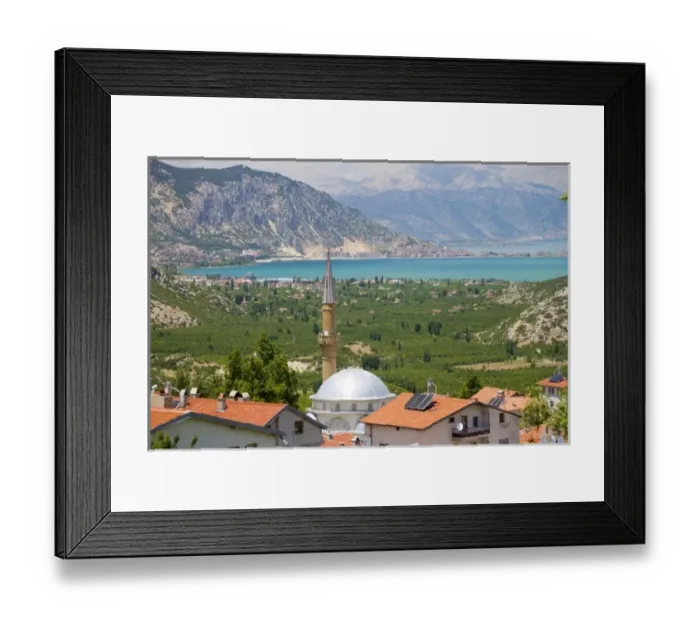 Framed Print : View of Lake Egirdir beyond hilly green land, village mosque with tin dome in front Framed Print : View of Lake Egirdir beyond hilly green land, village mosque with tin dome in front