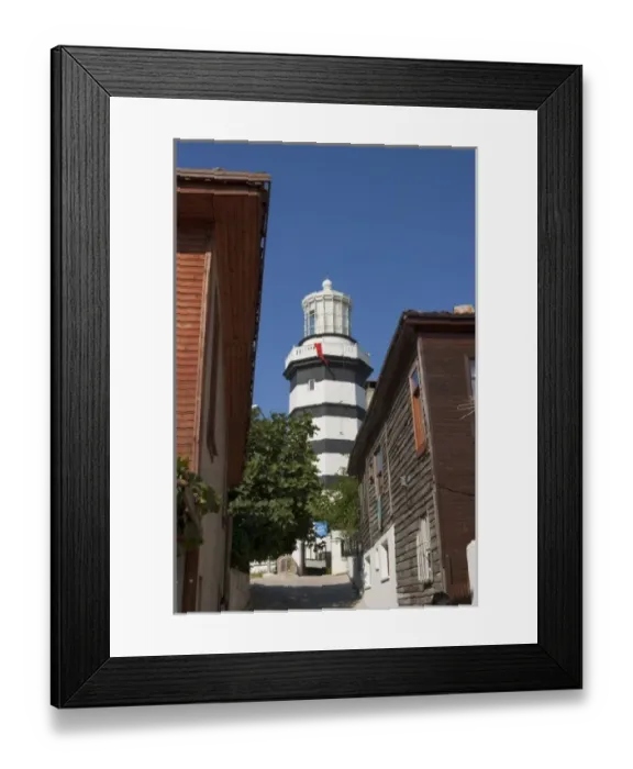 Framed Print : Lighthouse of Sile as seen behind old wooden houses, Istanbul, Turkey Framed Print : Lighthouse of Sile as seen behind old wooden houses, Istanbul, Turkey