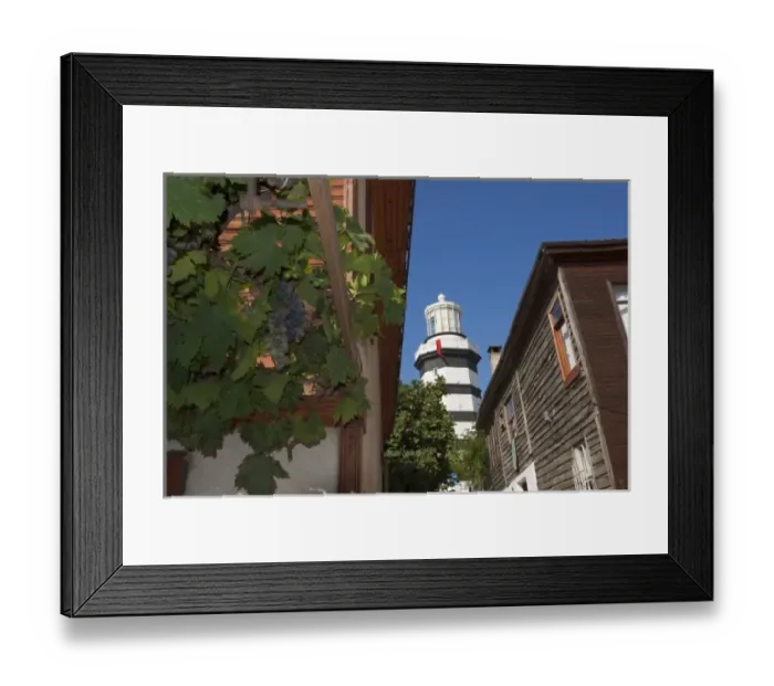 Framed Print : Lighthouse of Sile as seen behind old wooden houses, Istanbul, Turkey Framed Print : Lighthouse of Sile as seen behind old wooden houses, Istanbul, Turkey