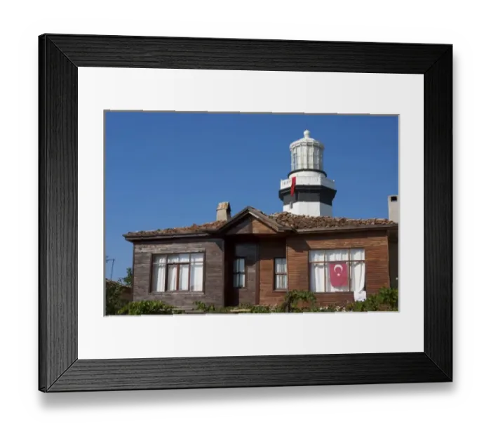 Framed Print : Lighthouse of Sile as seen behind an old wooden house, Istanbul, Turkey Framed Print : Lighthouse of Sile as seen behind an old wooden house, Istanbul, Turkey