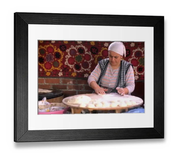 Framed Print : Native woman making bread in Istanbul Turkey (MR)