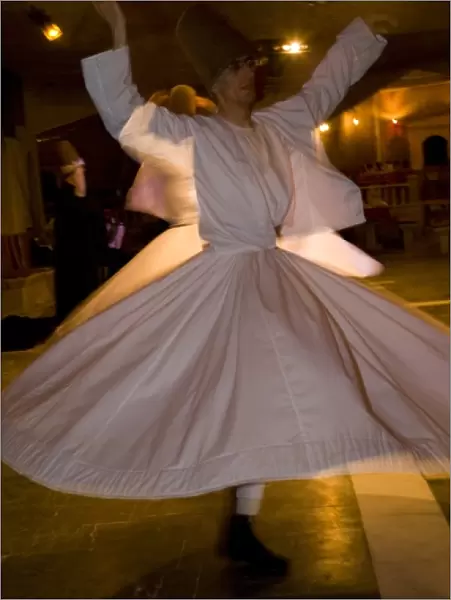 Middle East central part of Turkey in Cappadocia Whirling Dervishes dancing in underground