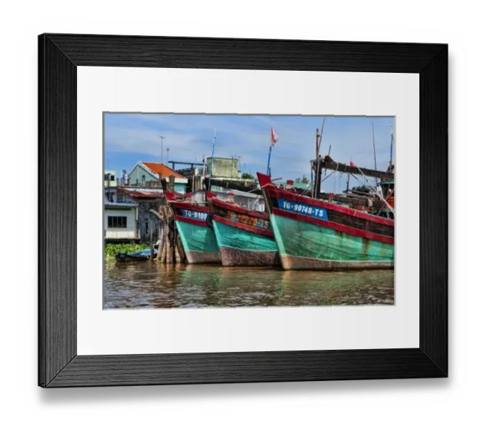 Framed Print : Mekong Delta. A row of fishing boats below Ho Chi Minh City (Saigon), Vietnam