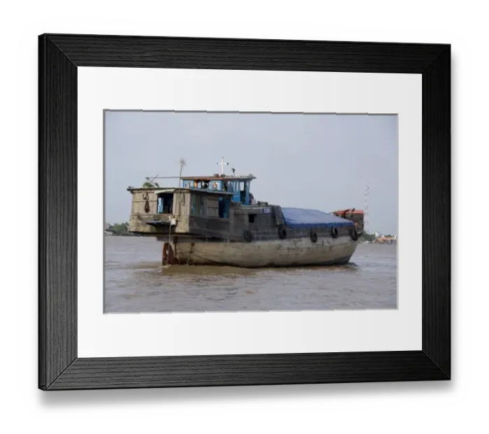 Framed Print : Vietnam, Ho Chi Minh City (aka Saigon). Delta port town of My Tho, views along Framed Print : Vietnam, Ho Chi Minh City (aka Saigon). Delta port town of My Tho, views along